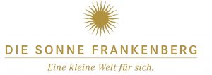 Ein goldenes Sonnenschliff-Logo über dem Text "DIE SONNE FRANKENBERG" und dem Spruch "Eine kleine Welt für sich." in Gold auf weißem Hintergrund.